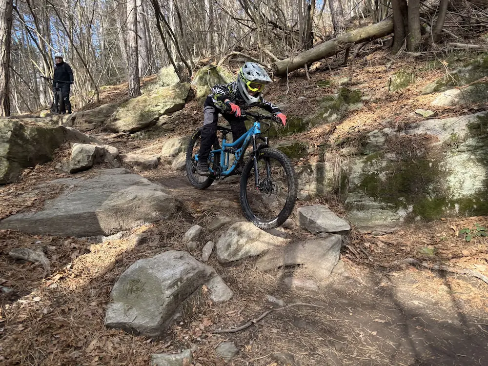 Families enjoying the Trails Unlimited Family Split Camp in Finale Ligure, Italy, held from May 27-30, featuring group mountain biking and professional guiding