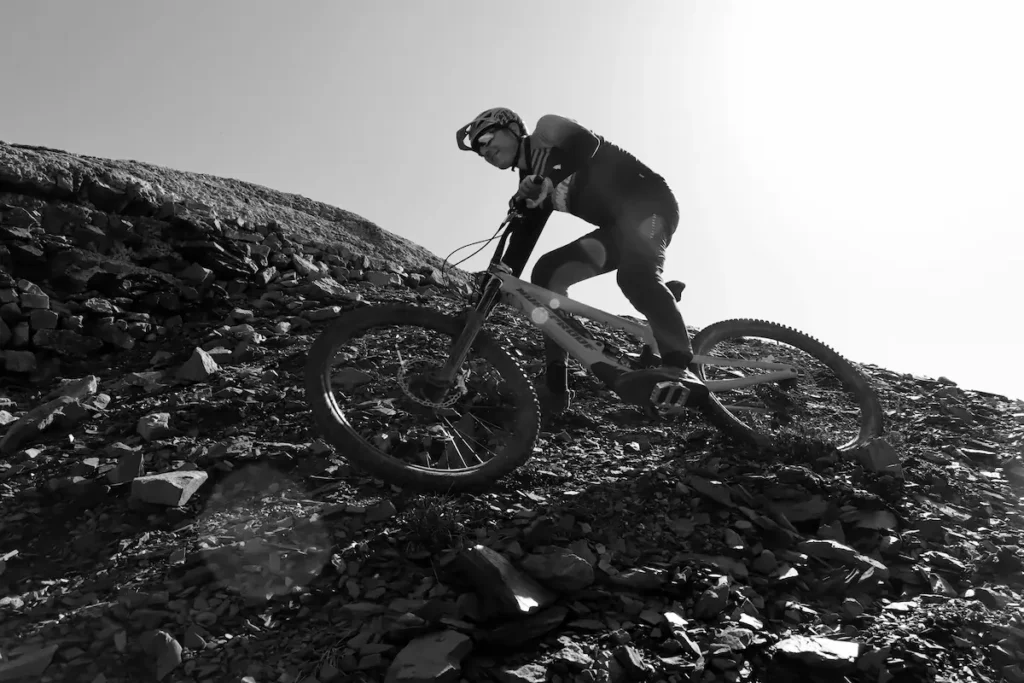 Stefano, professional MTB guide at Trails Unlimited, riding on Italian trails.