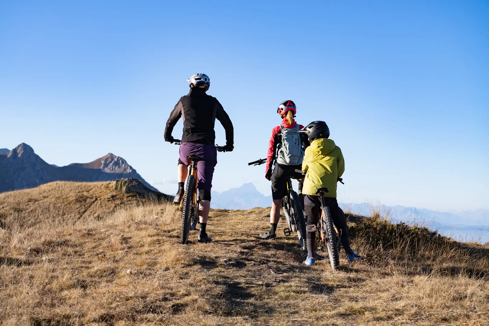 Mountain bikers enjoying the stunning mountain views on the Bicknell Ciclovia trail by Trails Unlimited.